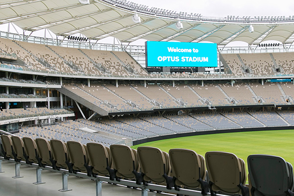 A ceremony in the grandstand of Optus Stadium’s seating bowl